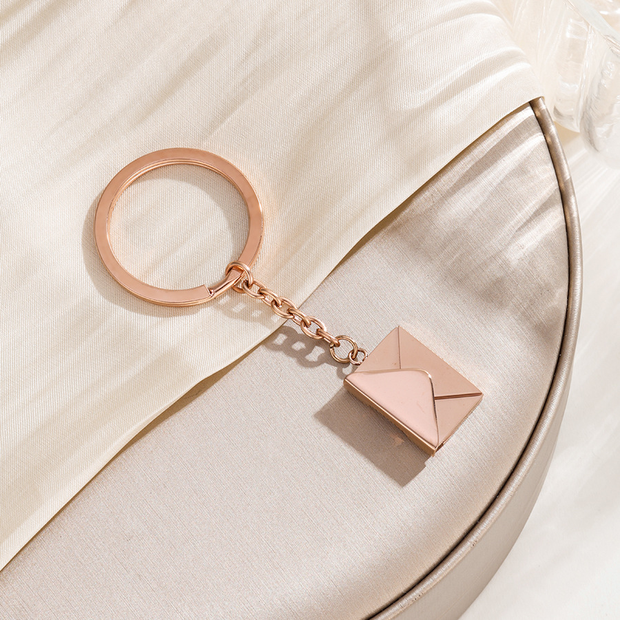 Can Open Envelope Custom Keych - مراجعة Initial Ring Custom وسعره