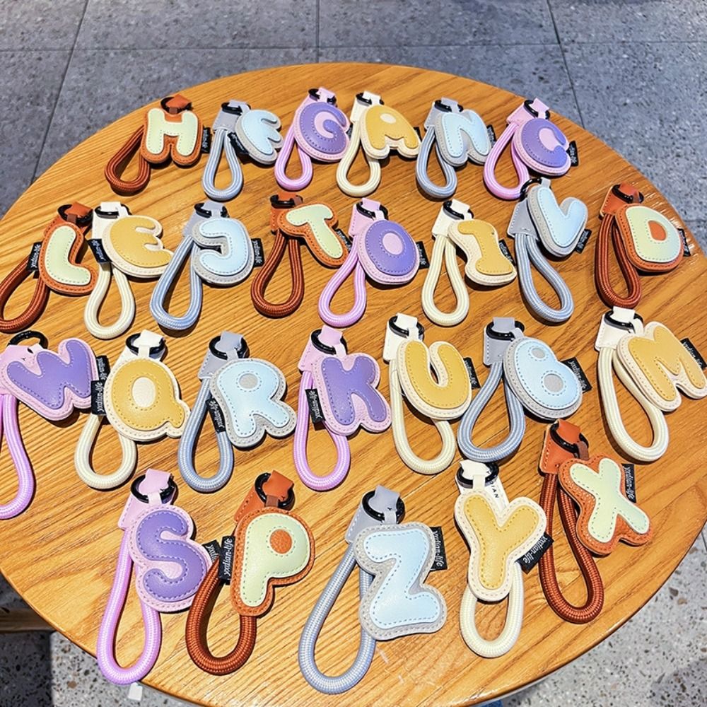 Sweet 26 Letter Keychain PU Le - مراجعة Monogram Keychain Leather وسعره