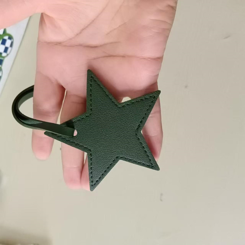 Free initials five pointed sta - مراجعة Monogram Keychain Leather وسعره